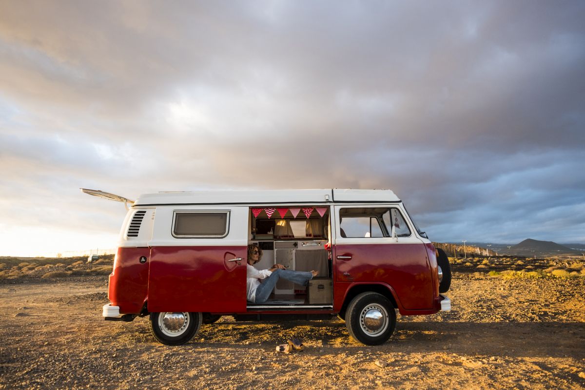 woman on an antique van